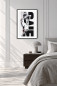 Preview: OFF SCRIPT black and white Urban Art print in bright modern bedroom with taupe linen bedding